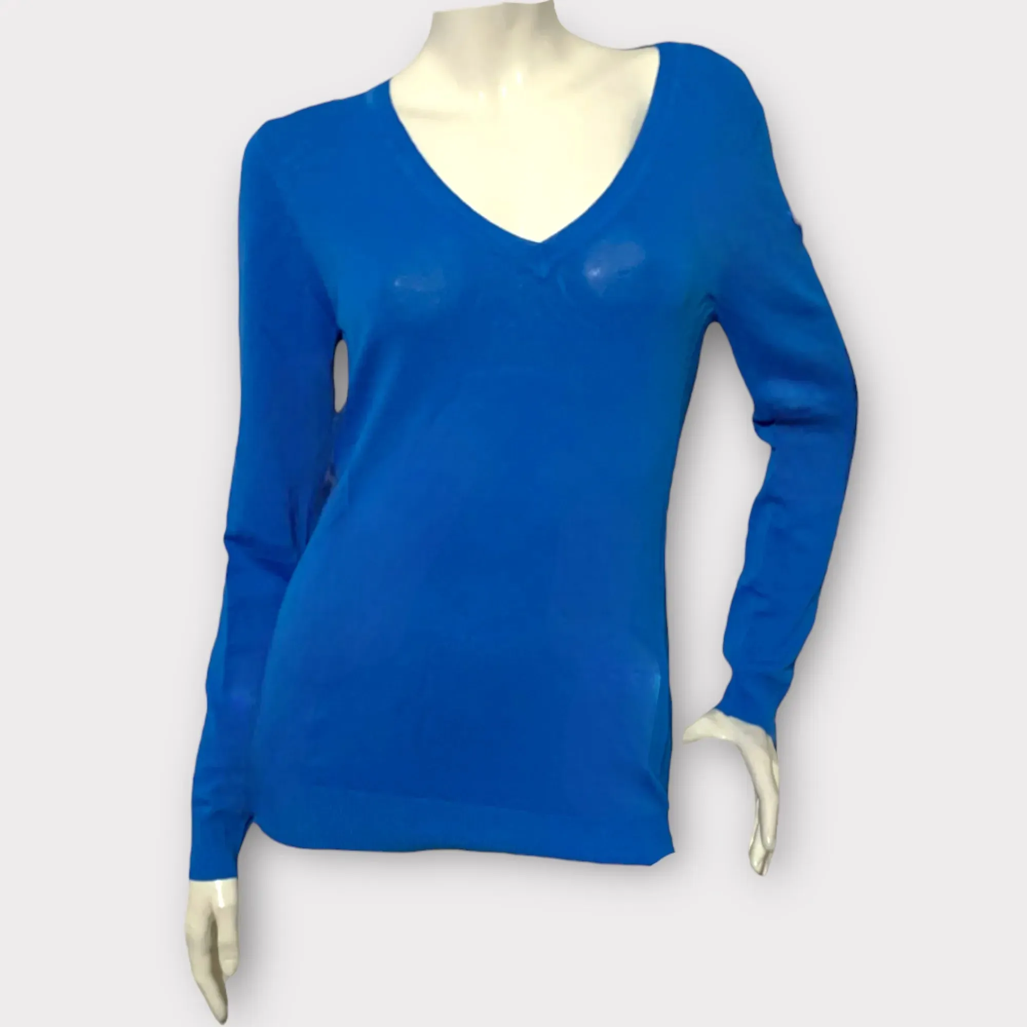 Koralline – Maglia azzurra scollo a V