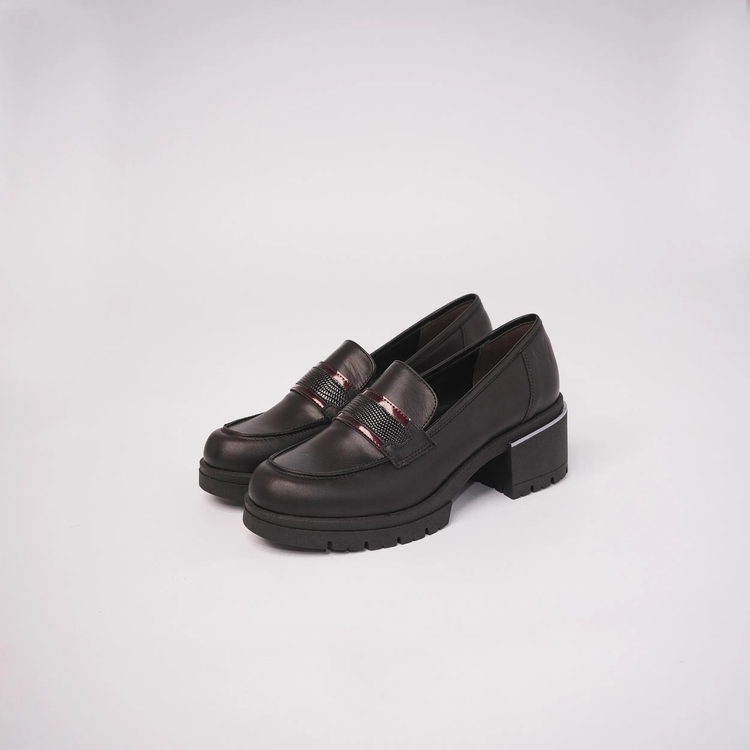 Mocassino con tacco alto in pelle